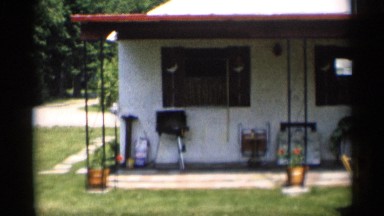 1959: the video is shown three peoples are relaxing in their outside