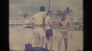 1959: group of people enjoying a fun day at the beach together INDIANA