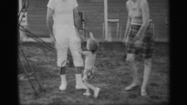 1959: Black & White Home Movie of Parents with Young Child Playing