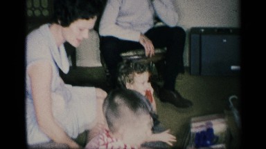 1959: the video file shows two children and two adults are playing