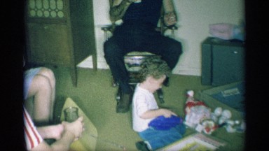 1959: a big family drink for the juice in very happy and sitting child play