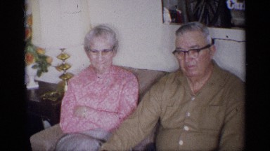 1959: a kid sitting near with his grand father and mother and say bye bye