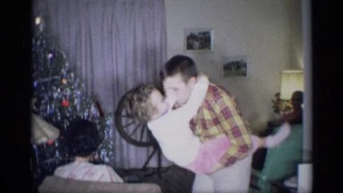 1959: a boy dips, and almost drops his sister as they dance together NEW YORK