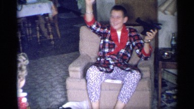 1959: a boy showing pairs of shocks NEW YORK