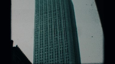 1959: a big building to low angle view green color long shape model top to tower