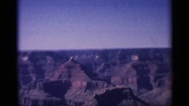 1959: deep colored sky, over a rocky, western-style landscape. ARIZONA