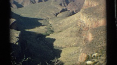 1959: a hills station top angle view near to water and green tree grasses rock