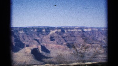 1959: camera panning across a large canyon viewing its vast mountains