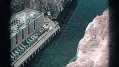 1959: zooming into bird flying over water ARIZONA