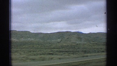1959: green valley shown from the car window the car moved very fast