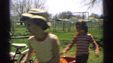1959: play in the ground near bye cycle and green grasses tree house steel