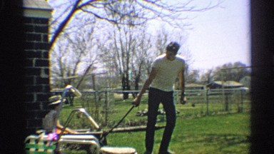 1959: man pulls two little wagons with children in them ARIZONA