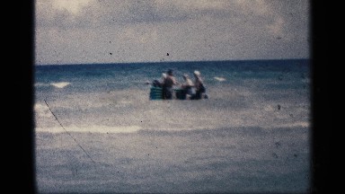 1959: 3 people returning from a swim at sea CALIFORNIA