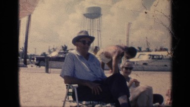 1959: public pool with friends and family CALIFORNIA