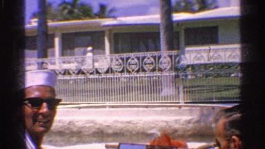 1959: two guys talking at the ground of the garden