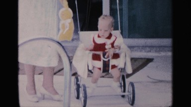 1959: mother showing her affection towards her little 2 year old daughter