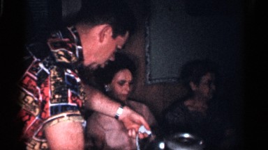 1959: family having lovable members and enjoying the dinner together in a family