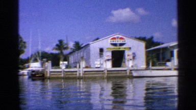 1959: the man traveled on the boat and watching the water source