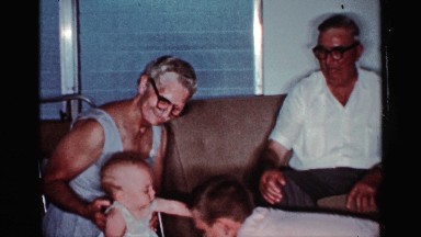 1959: grand mother, grandfather and brother are playing with a baby girl FLORIDA