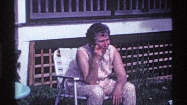 1969: citizens gathered in a yard enjoying a warm looking summer day. OHIO