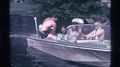 1969: a weekend boat trip in a lake with beautiful family to enjoy the time.