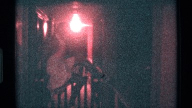 1973: Woman in White Dress Poses on Wooden Railing at Night Before Climbing