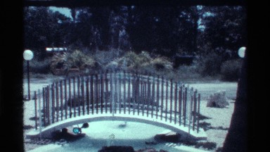 1973: perfect yard with a small bridge and water fountain