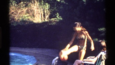 1978: Girl Plays With Ball And Throws It In California Backyard