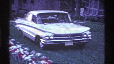 1969: cars parked on the grass near docks with small boats tied to them OHIO