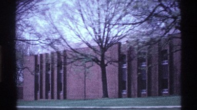 1969: a man shown the road trees and homes this side. OHIO