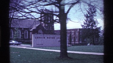 1969: view from a moving vehicle as it drives down the road OHIO