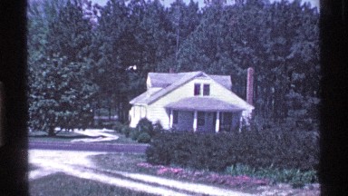 1969: beautiful view of a farmhouse and greenish surrounded by farm animals
