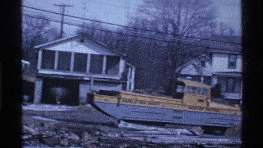 1969: Panning Across Residential Hillside Street in Winter Ohio
