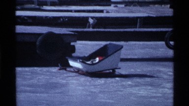 1969: some transport vehicle and kid sitting vehicle are placed at the outside