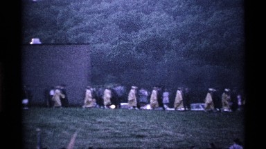 1969: a large line of people walking down a hill after graduation OHIO