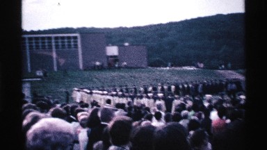 1969: people watching and participating in a graduation ceremony OHIO