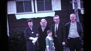 1969: family gets together in a gathering and prepares for a photo together OHIO