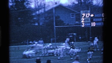 1969: the football match in the ground sand to white code near to wall