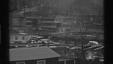 1969: a place that may be a rural area with some houses and water