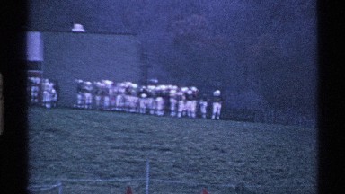 1969: a player exercise for the green grasses ground in the morning time