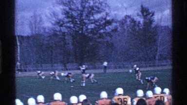 1969: playing football with team,in a ground practice for a match event. OHIO