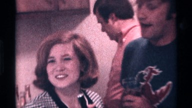 1976: Man Answers Woman's Question, Touching Microphone, Kentucky
