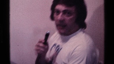 1976: A Man Talks Into a Microphone While Looking at the Camera Kentucky