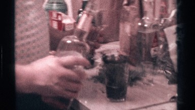 1976: the person pouring the beer from one bottle to glass KENTUCKY