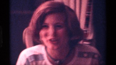 1976: A Funny Incident, a Woman Interviewing a Man Who Is Lying Upside Down