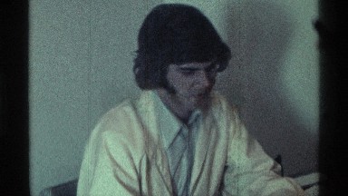 1976: man shuffling through papers while being interviewed KENTUCKY
