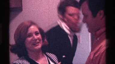 1976: Interior with Smiling Individuals Using Microphone, Kentucky