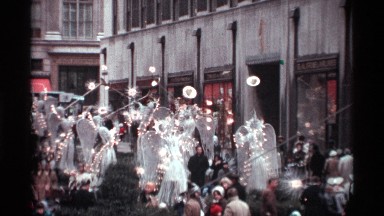 1970: people gathered around in a city for celebrations NEW YORK CITY