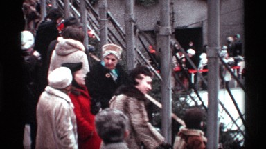 1970: woman pointing in coat NEW YORK CITY