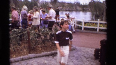 1974: a boy searching the family on the road with background enjoyable